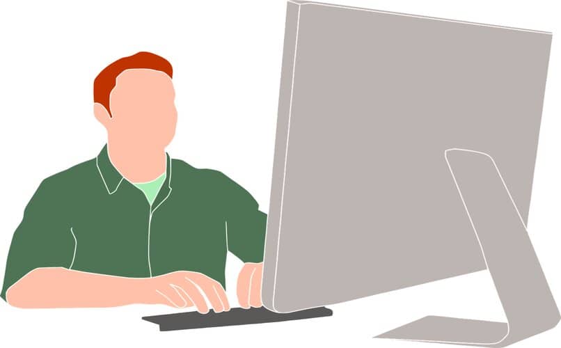 hombre frente a monitor de pc